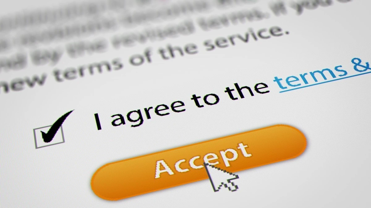 an image of a stock image highlighting an orange 'agree' button